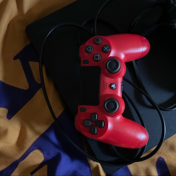 PlayStation 4 slim with 500gb and minor defeats also comes with 2 controllers.